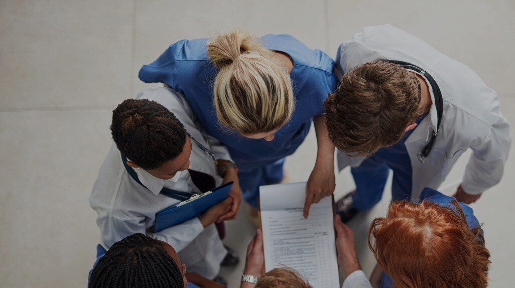 Nurses and doctor standing together for the onboarding