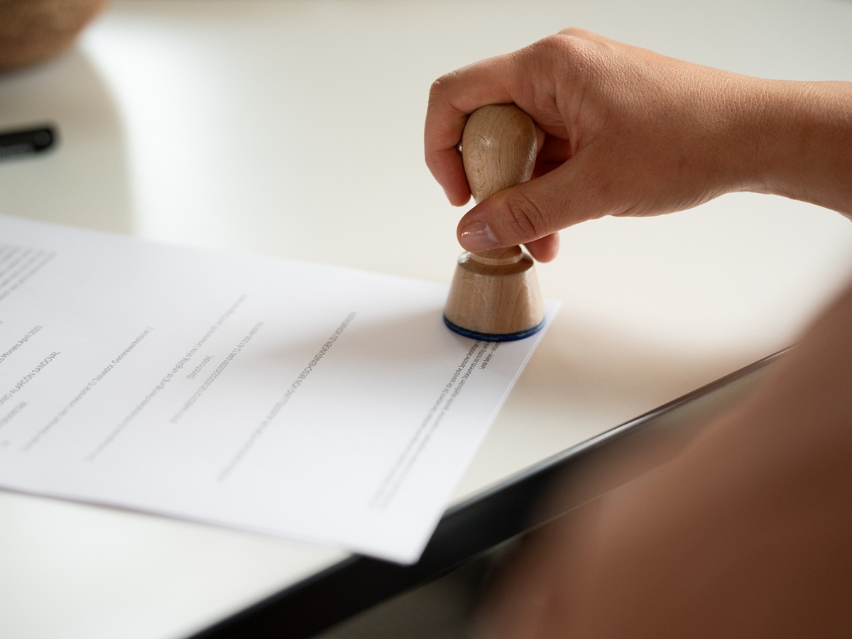 Translator stamping a certified translation